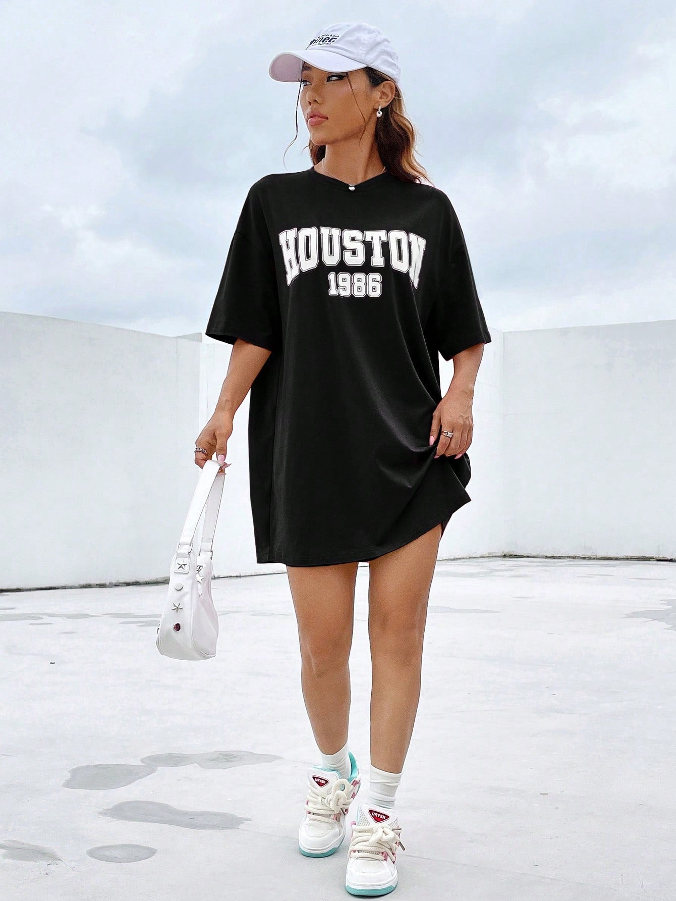 Camiseta Básica Feminina Com Estampa Houston 1986